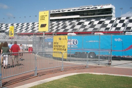 Temporary fencing and banners at a racetrack